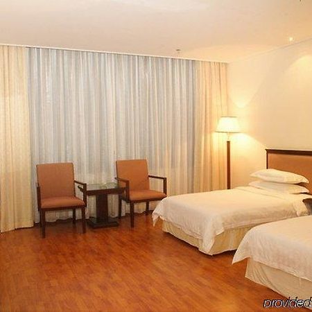 Raystar Hotel Cantón Habitación foto